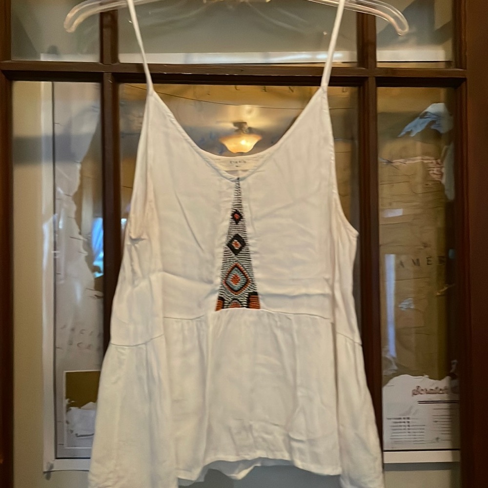 White tank top with embroidered detail